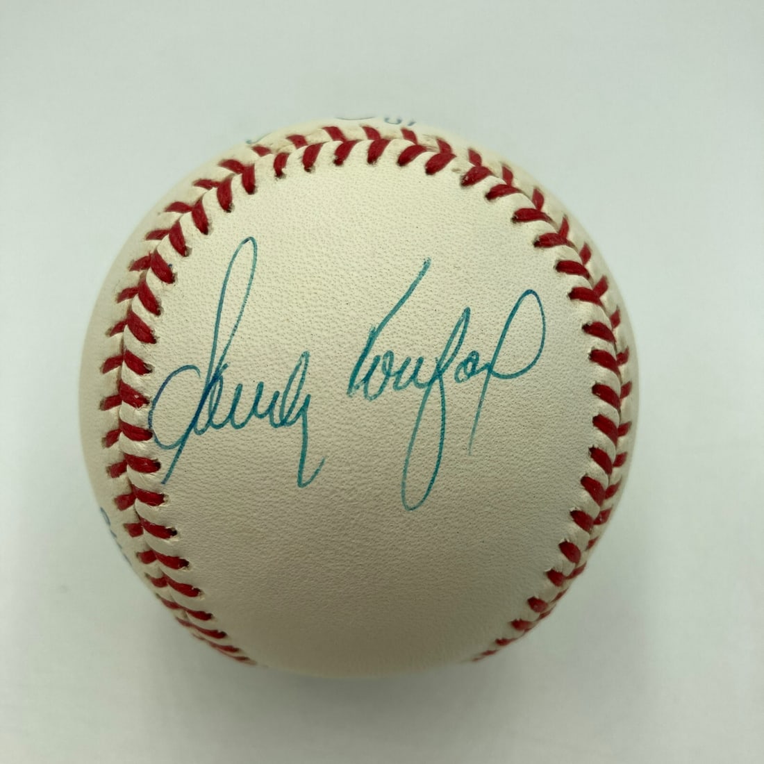 Sandy Koufax Nolan Ryan Bob Feller Signed Baseball with JSA COA: Sandy Koufax Nolan Ryan Bob Feller Signed Baseball with JSA COA This authentic American League baseball features the signatures of legendary baseball players Sandy Koufax, Nolan Ryan, and Bob Feller. 