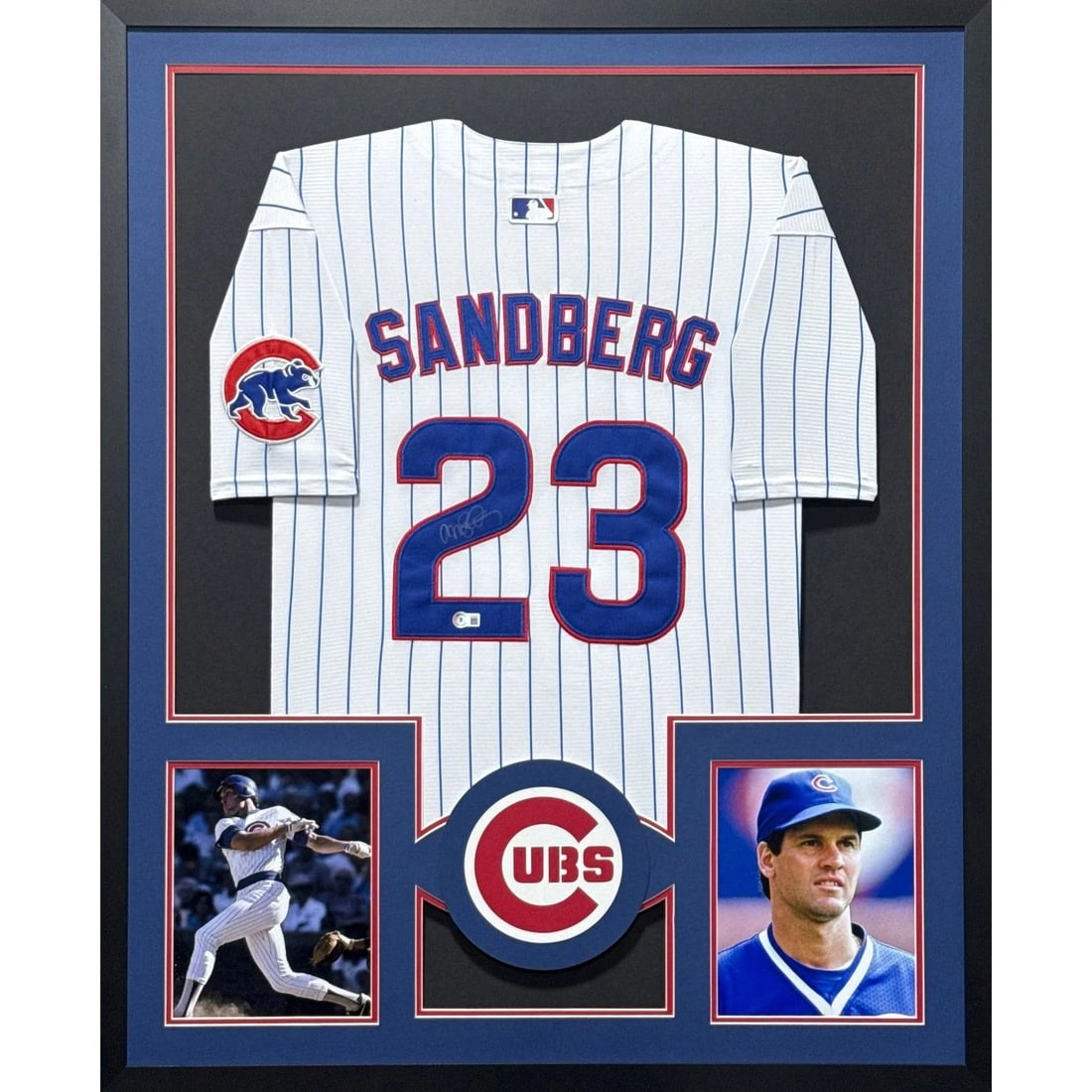 Framed Beckett Authenticated Ryne Sandberg Autographed Chicago Cubs Jersey: Framed Beckett Authenticated Ryne Sandberg Autographed Chicago Cubs Jersey This framed Chicago Cubs jersey features the autograph of Ryne Sandberg and is authenticated by Beckett, including a tamper-p
