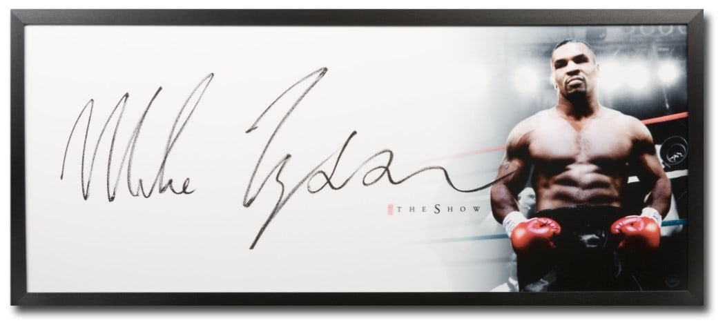 Mike Tyson Autographed The Show Framed 46x20 Photo Upper Deck Authenticated: Mike Tyson Autographed The Show Framed 46x20 Photo Upper Deck Authenticated This stunning framed photo features boxing legend Mike Tyson, showcasing his incredible prowess in the sport. Measuring 46x2