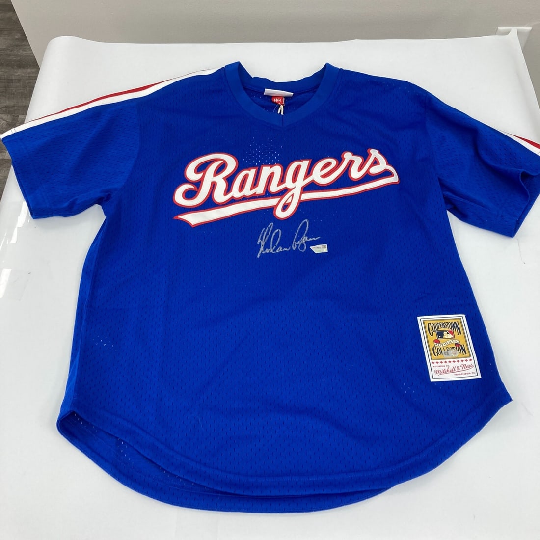 Nolan Ryan Signed Authentic Texas Rangers Jersey Mitchell & Ness Fanatics COA: Nolan Ryan Signed Authentic Texas Rangers Jersey Mitchell & Ness Fanatics COA This authentic Texas Rangers jersey features the legendary Nolan Ryan's signature, making it a must-have for any baseball