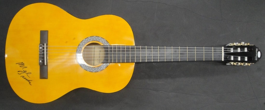 Acoustic Guitar Signed by Mel Brooks with JSA Authentication: Acoustic Guitar Signed by Mel Brooks with JSA Authentication This is an original acoustic guitar hand signed by Mel Brooks. The autograph has been authenticated by James Spence Authentication (JSA).