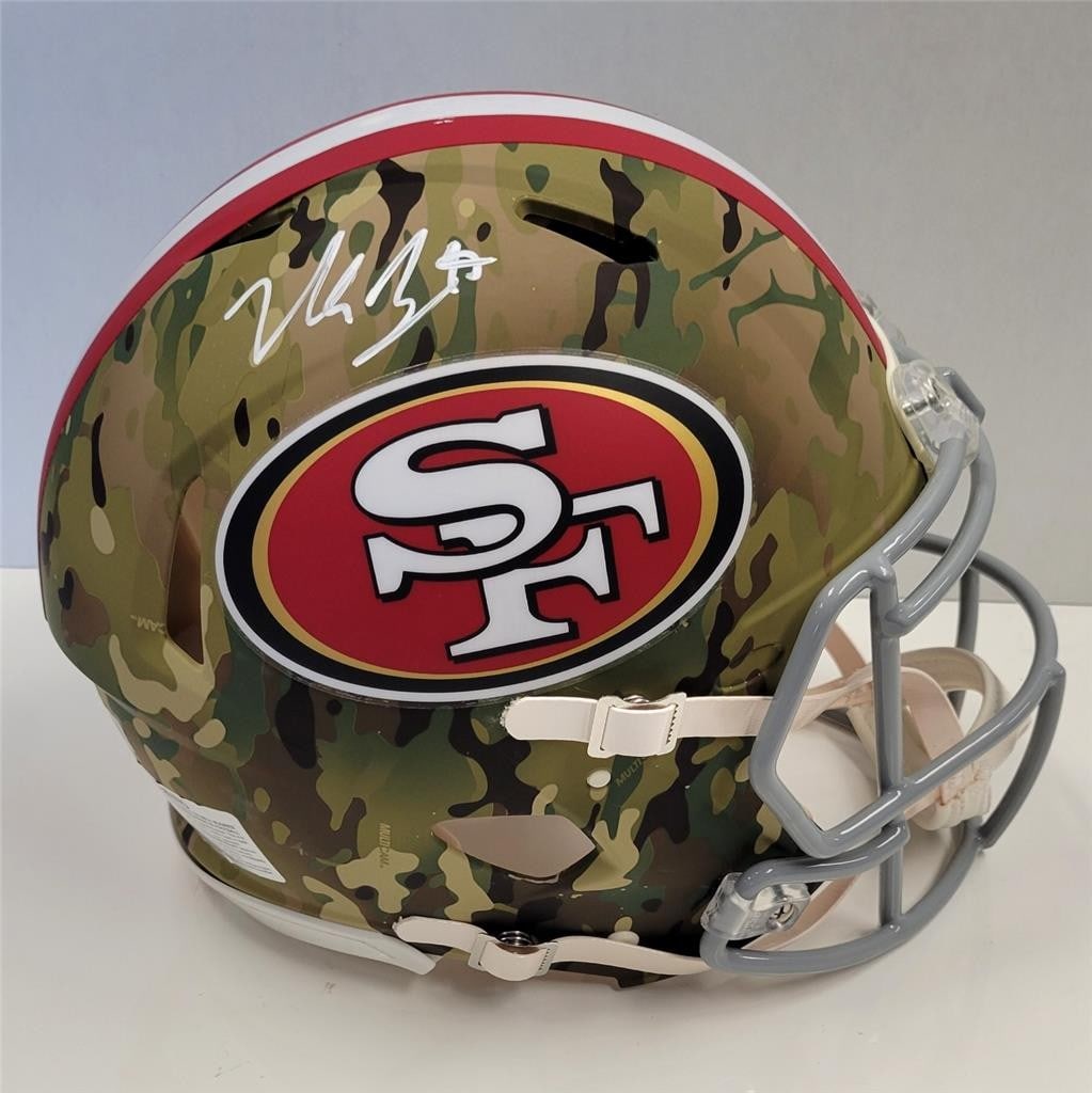 San Francisco 49ers Full Size Camo Speed Helmet Signed by Nick Bosa Beckett Authenticated: San Francisco 49ers Full Size Camo Speed Helmet Signed by Nick Bosa Beckett Authenticated This is a pre-owned San Francisco 49ers full size authentic Speed camo helmet signed by Nick Bosa. The autogra