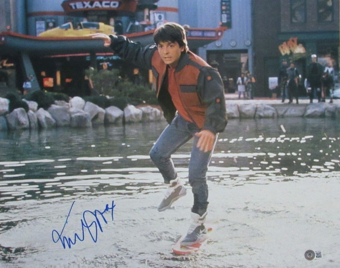 Michael J Fox Signed Back to the Future 16x20 Photo BAS Authenticated: Michael J Fox Signed Back to the Future 16x20 Photo BAS Authenticated This is a remarkable 16x20 inch photograph of Michael J. Fox from "Back to the Future," hand-signed by the actor himself. The auto