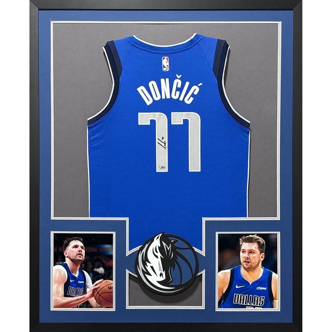 Framed Dallas Mavericks Jersey Signed by Luka Doncic with Fanatics Authentication: Framed Dallas Mavericks Jersey Signed by Luka Doncic with Fanatics Authentication This is a framed Dallas Mavericks jersey autographed by Luka Doncic. The item includes authentication by Fanatics and 