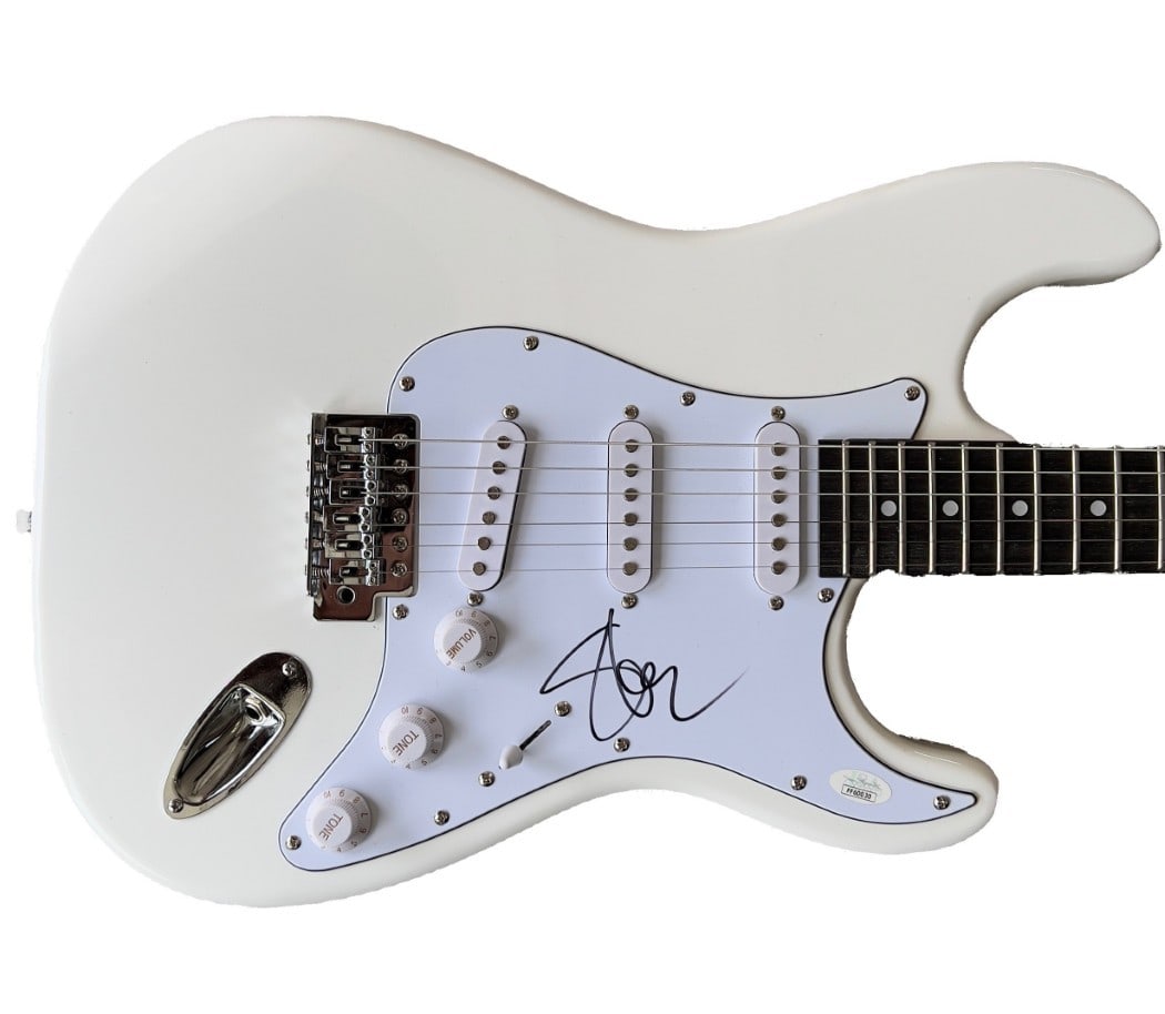Steve Stevens Autographed Electric Guitar Kings Of Chaos JSA Certified: Steve Stevens Autographed Electric Guitar Kings Of Chaos JSA Certified This authentic electric guitar is signed by renowned guitarist Steve Stevens, known for his work in the band Kings of Chaos. The 