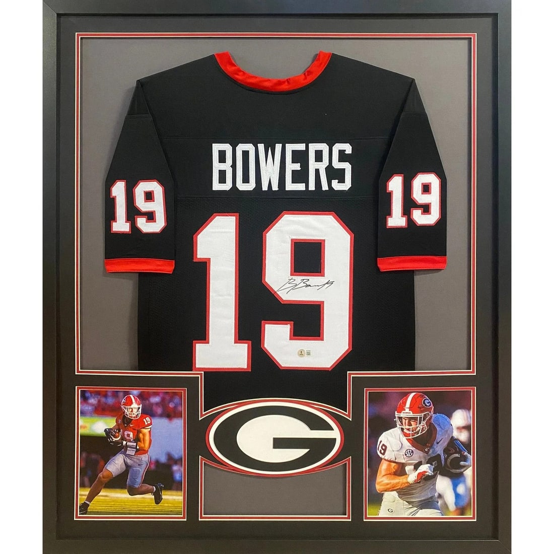 Framed Brock Bowers Georgia Jersey Signed With Beckett Authentication: Framed Brock Bowers Georgia Jersey Signed With Beckett Authentication This framed black Georgia jersey is autographed by Brock Bowers and authenticated by Beckett, featuring a tamper-proof sticker for