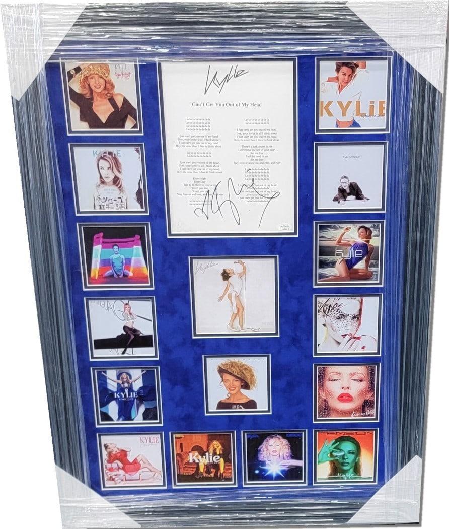 Kylie Minogue Signed Script Framed Collage JSA Authenticated 26x36: Kylie Minogue Signed Script Framed Collage JSA Authenticated 26x36 This framed collage features a signed script of Kylie Minogue's iconic song "Can't Get You Out Of My Mind." The piece measures 26x36 