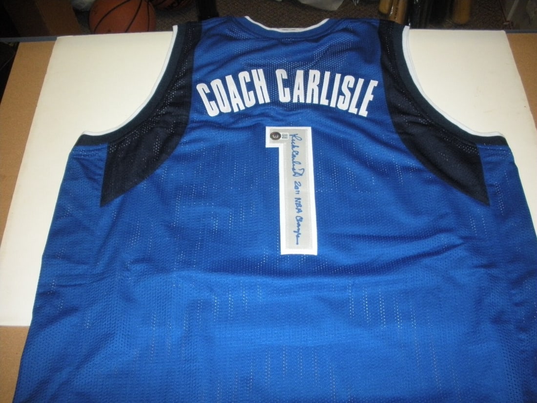 Rick Carlisle Signed Dallas Mavericks 2011 NBA Champs Jersey with COA: Rick Carlisle Signed Dallas Mavericks 2011 NBA Champs Jersey with COA Celebrate the Dallas Mavericks' 2011 NBA Championship with this authentic signed jersey by Rick Carlisle, the team's head coach. T