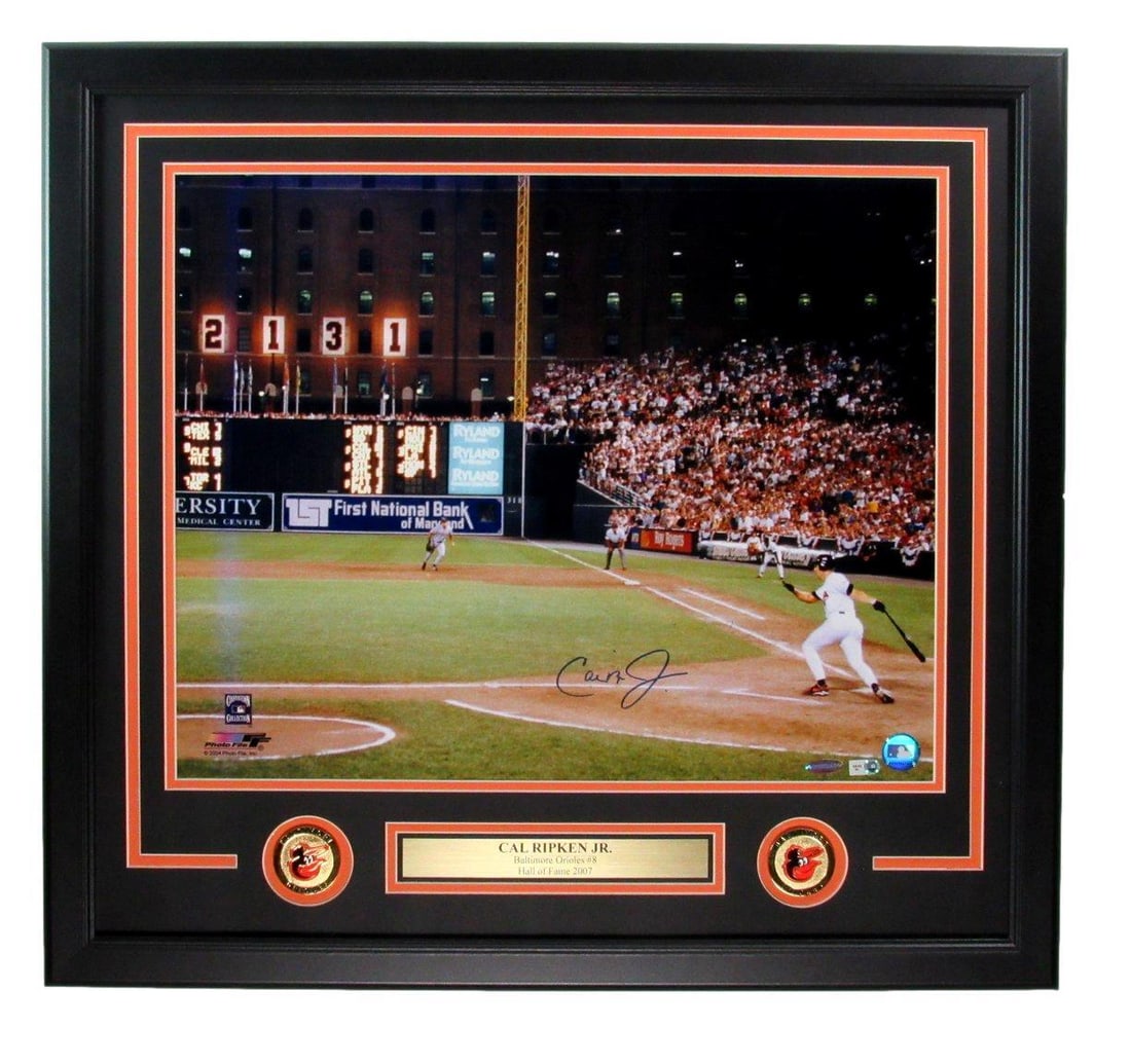 Cal Ripken Jr. HOF Signed 16x20 Photo Framed MLB Authenticated: Cal Ripken Jr. HOF Signed 16x20 Photo Framed MLB Authenticated This stunning 16x20 photo features Cal Ripken Jr., a Baseball Hall of Famer, showcasing his legacy with the Baltimore Orioles. The photo 