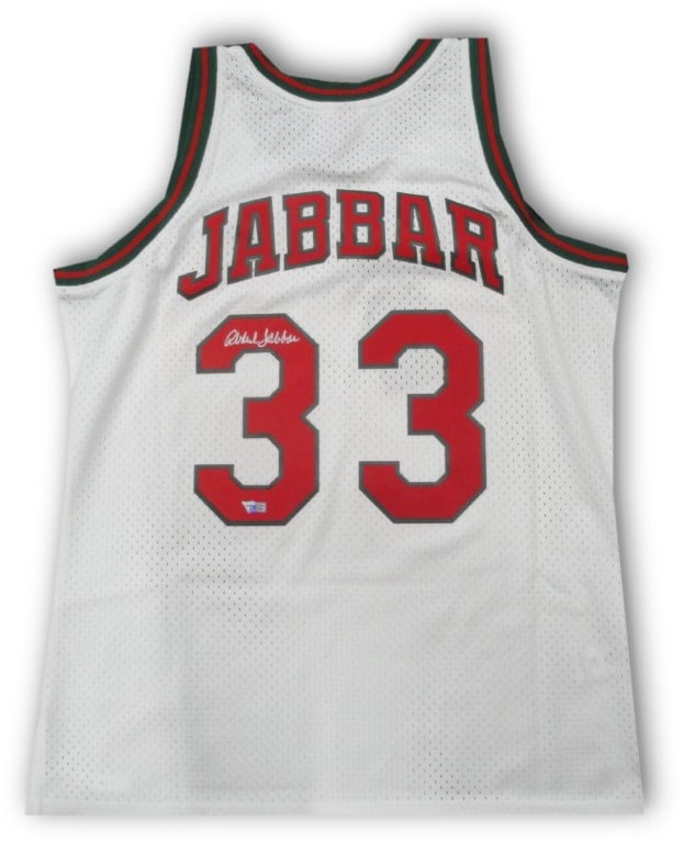 Kareem Abdul-Jabbar Signed Mitchell & Ness Jersey Bucks Authentic: Kareem Abdul-Jabbar Signed Mitchell & Ness Jersey Bucks Authentic This is an original signed jersey by Kareem Abdul-Jabbar, featuring the classic Milwaukee Bucks design. This Mitchell & Ness Hardwood 