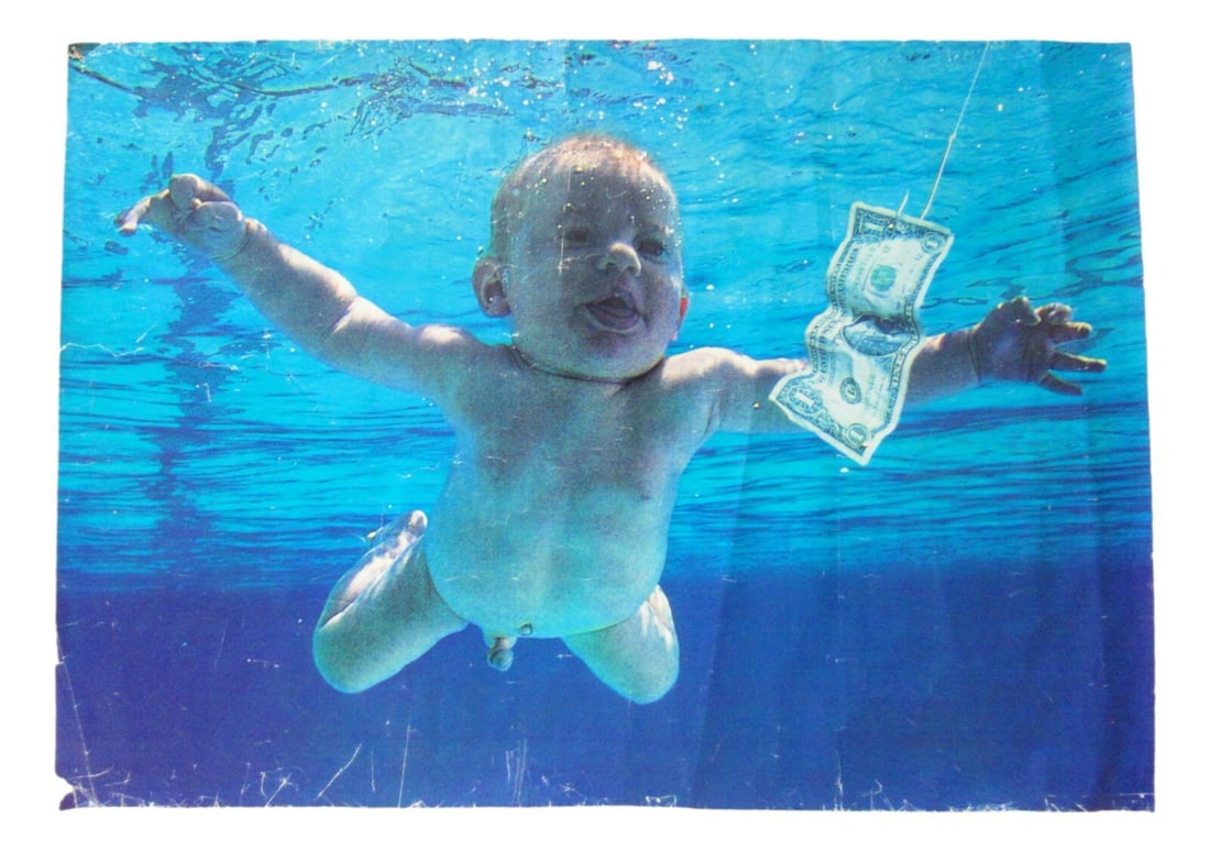 Original 1991 Nirvana Nevermind Promotional Poster Without Logo or Album Text: Original 1991 Nirvana Nevermind Promotional Poster Without Logo or Album Text This is an original vintage promotional poster from 1991 for Nirvana's "Nevermind" album. The poster features no logo or a
