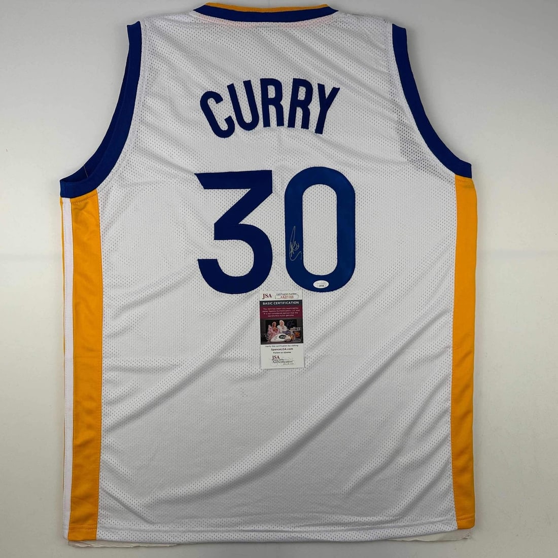 Stephen Curry Autographed Golden State Warriors White Jersey JSA COA: Stephen Curry Autographed Golden State Warriors White Jersey JSA COA Celebrate your love for basketball with this authentic autographed Stephen Curry Golden State Warriors white jersey. This custom je