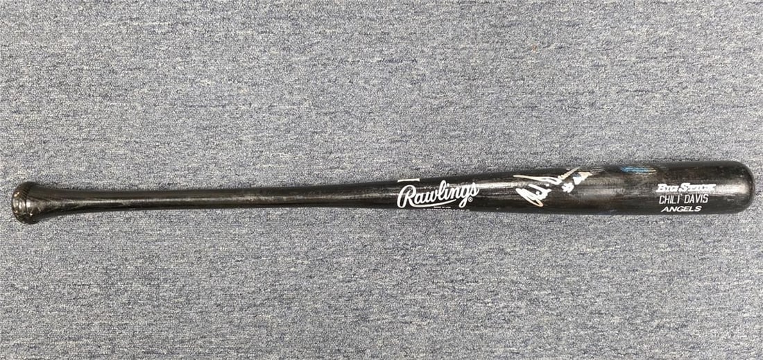 Game Used Bat Signed by Chili Davis with JSA Authentication: Game Used Bat Signed by Chili Davis with JSA Authentication This is a game-used personal bat autographed by Chili Davis from his time with the Angels, authenticated by JSA. The bat is officially licen
