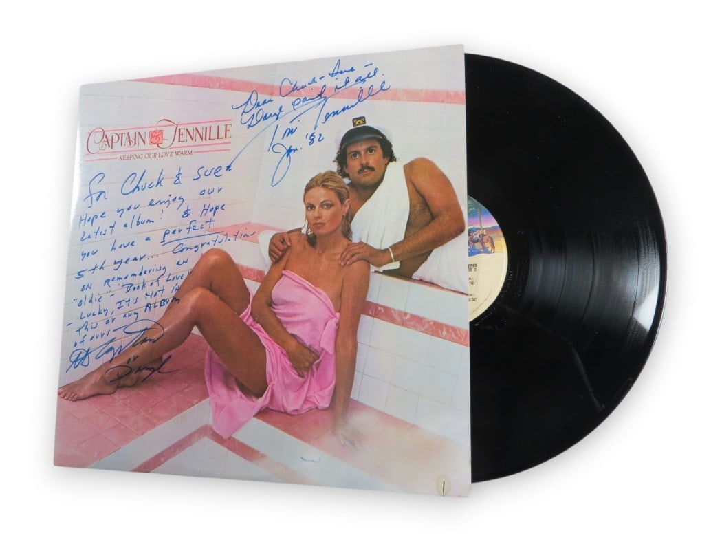 Captain & Tennille Autographed Album Cover Daryl Dragon Toni Tennille Beckett Authenticated: Captain & Tennille Autographed Album Cover Daryl Dragon Toni Tennille Beckett Authenticated This is an original autographed album cover by the iconic duo Daryl Dragon and Toni Tennille, known as Capta