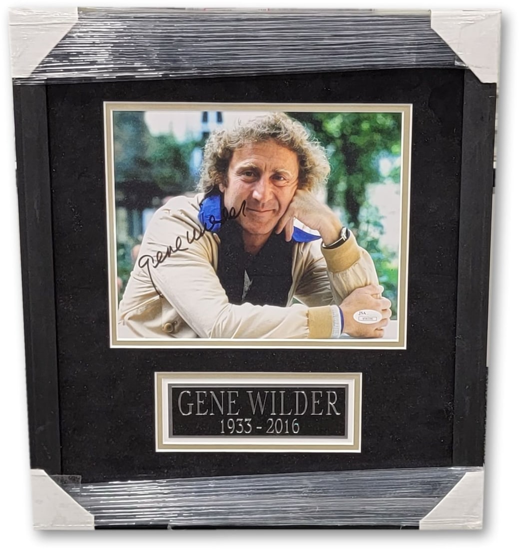 Gene Wilder Autographed 11x14 Framed Photo JSA Authenticated: Gene Wilder Autographed 11x14 Framed Photo JSA Authenticated This stunning 11x14 photograph of Gene Wilder, featuring both his iconic roles as Willy Wonka and in Young Frankenstein, is an authentic pi