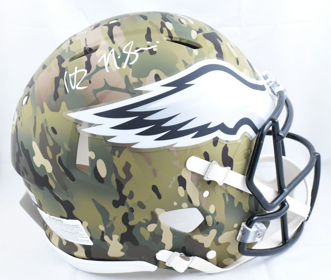 Philadelphia Eagles Full Size Camo Helmet Signed by Sirianni and Roseman: Philadelphia Eagles Full Size Camo Helmet Signed by Sirianni and Roseman This Philadelphia Eagles full-size camo Speed Authentic helmet is signed by Nick Sirianni and Howie Roseman. It is an original 