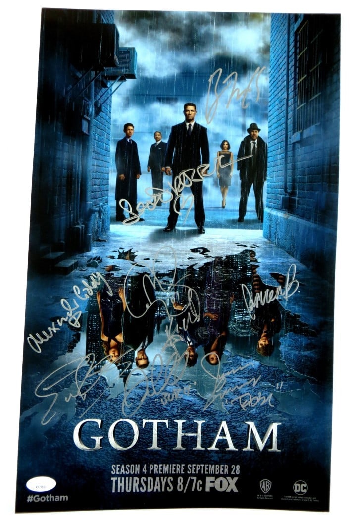 Gotham Cast Autographed 11x18 Poster JSA Certified 9 Signatures: Gotham Cast Autographed 11x18 Poster JSA Certified 9 Signatures This original 11" x 18" poster features autographs from the cast of Gotham, including Ben McKenzie, Robin Lord Taylor, Camren Bicondova,