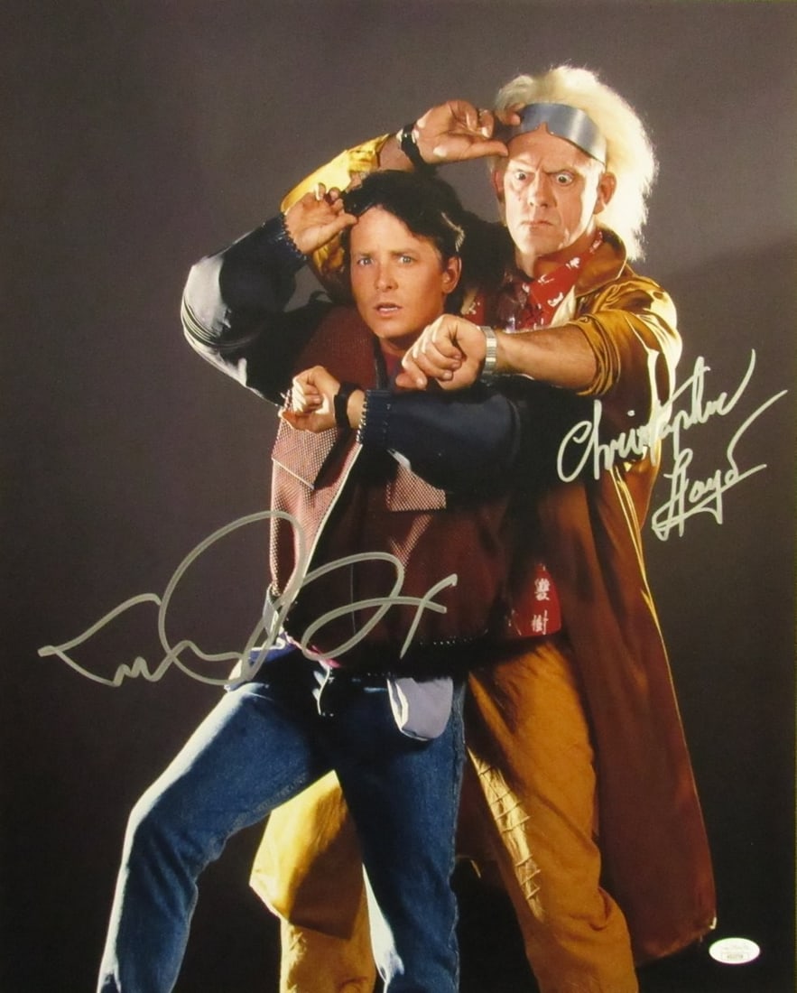Michael J Fox Christopher Lloyd Autographed 16x20 Back to the Future Photo JSA Certified: Michael J Fox Christopher Lloyd Autographed 16x20 Back to the Future Photo JSA Certified Own a piece of cinematic history with this autographed 16x20 photo of Michael J. Fox and Christopher Lloyd from