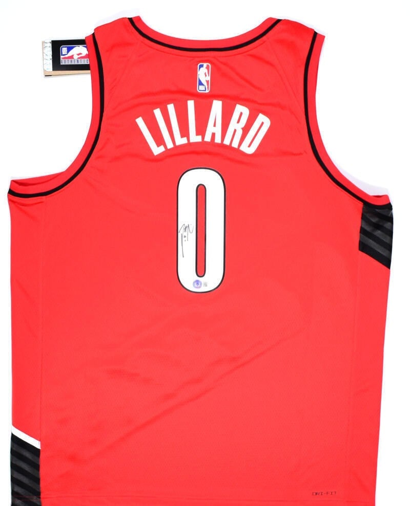 Damian Lillard Signed Portland Trail Blazers Nike Jersey Beckett Authenticated: Damian Lillard Signed Portland Trail Blazers Nike Jersey Beckett Authenticated This is an original Damian Lillard signed Portland Trail Blazers Nike Swingman red statement jersey. The jersey features 