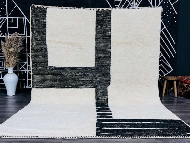 Moroccan Handwoven White Black Engraved Rug 100% Sheep Wool: Moroccan Handwoven White Black Engraved Rug 100% Sheep Wool Elevate your home decor with this Luxurious Authentic White & Black Engraved Rug, meticulously handwoven in the stunning Atlas Mountains by 