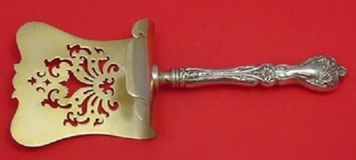 Alvin Majestic Sterling Silver Gold-Washed Asparagus Server 10": Alvin Majestic Sterling Silver Gold-Washed Asparagus Server 10" This exquisite 10" asparagus server is a part of the Majestic pattern by Alvin. Crafted from high-quality sterling silver, it features a