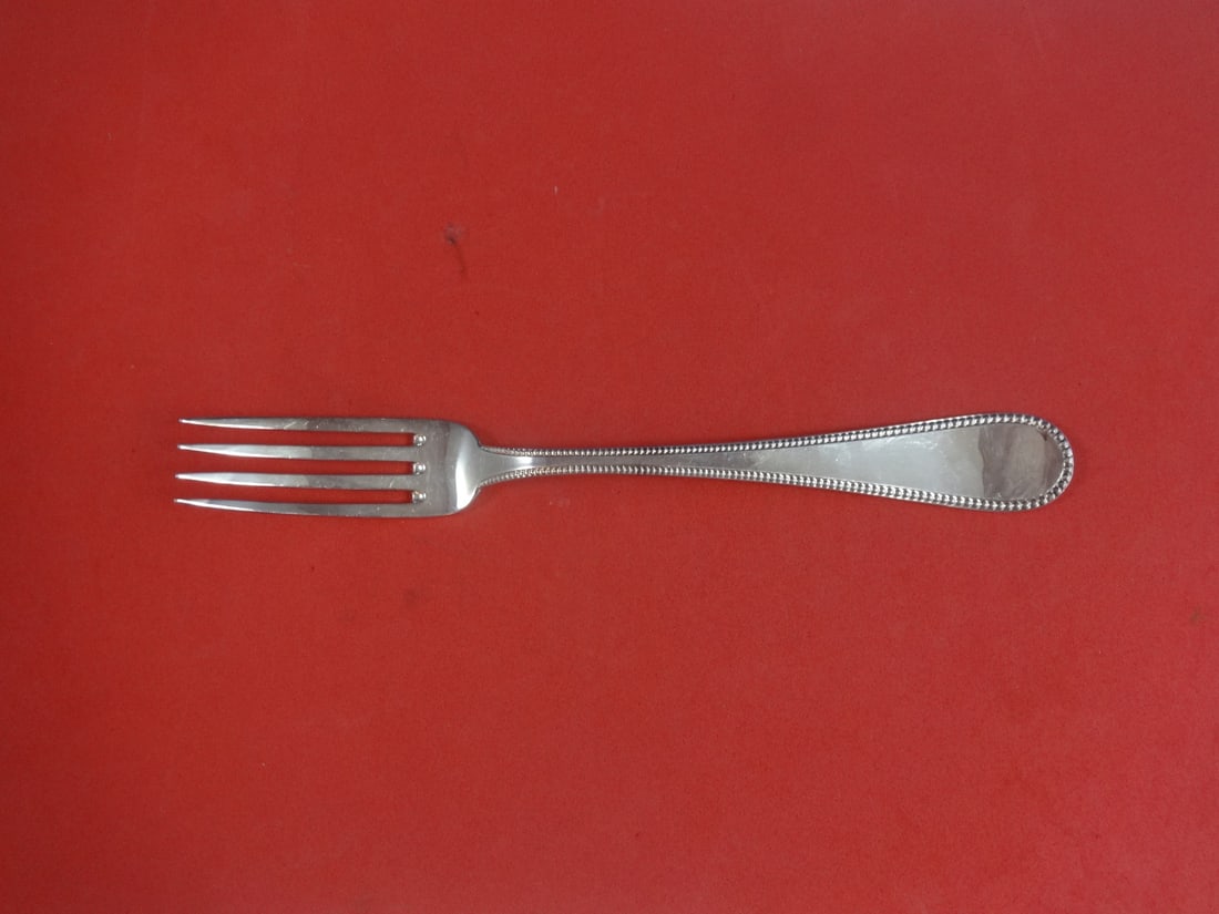 Ricci Donatello Sterling Silver 10 Inch Serving Fork Unused: Ricci Donatello Sterling Silver 10 Inch Serving Fork Unused This exquisite serving fork, designed in the elegant Donatello pattern by Ricci, measures 10 inches in length. Crafted from high-quality ste