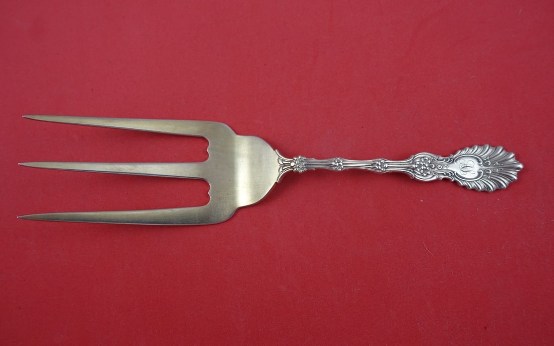 Whiting Radiant Sterling Silver Toast Fork 7 5/8 Faint Gold Wash: Whiting Radiant Sterling Silver Toast Fork 7 5/8 Faint Gold Wash This exquisite toast fork from the Radiant pattern by Whiting is crafted from sterling silver and features a faint gold wash. Measuring