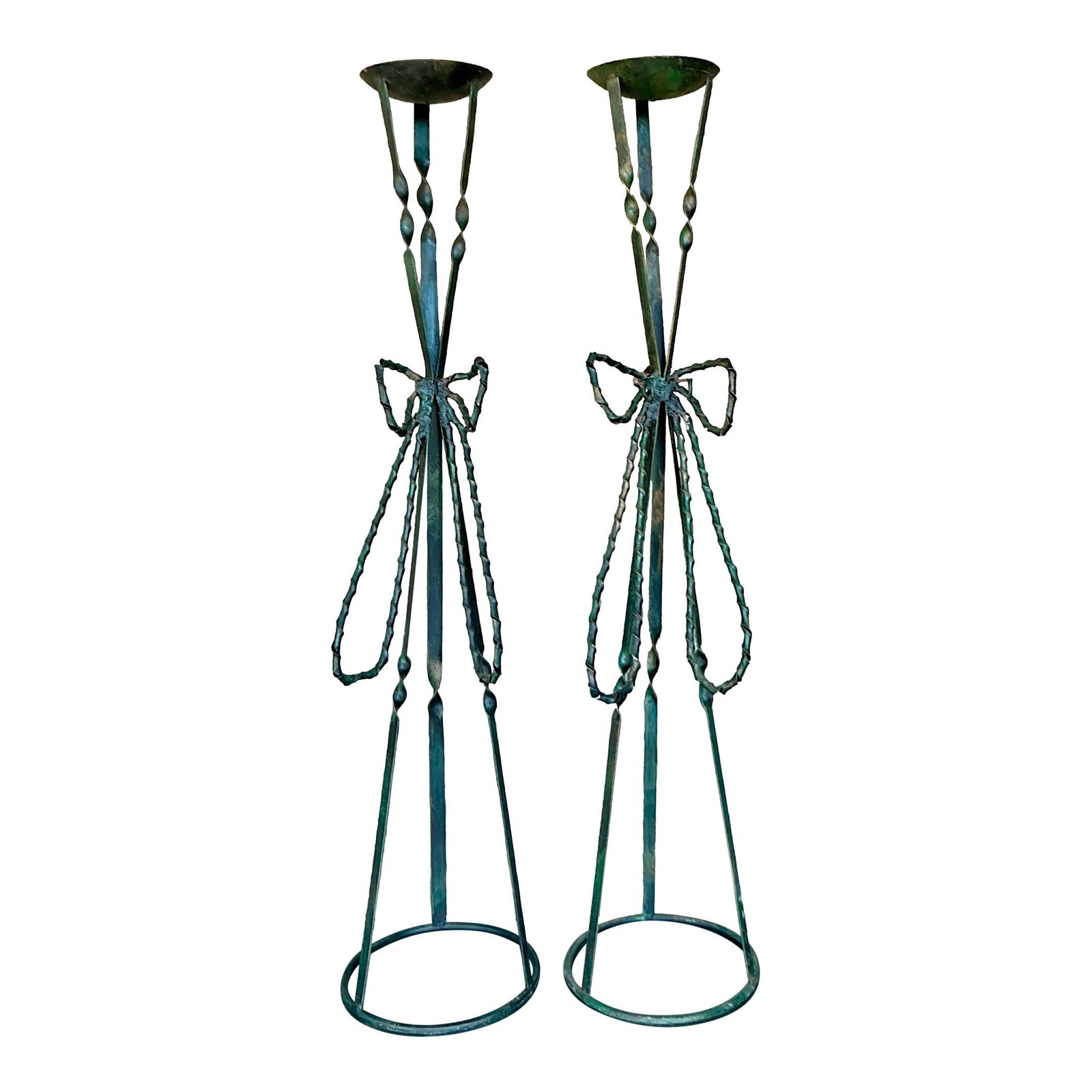 Vintage Wrought Iron Bow Candlesticks Pair 36.75in Dark Green: Vintage Wrought Iron Bow Candlesticks Pair 36.75in Dark Green Enhance your home decor with this exquisite pair of vintage wrought iron candlesticks. Showcasing a unique twisted metal design complement