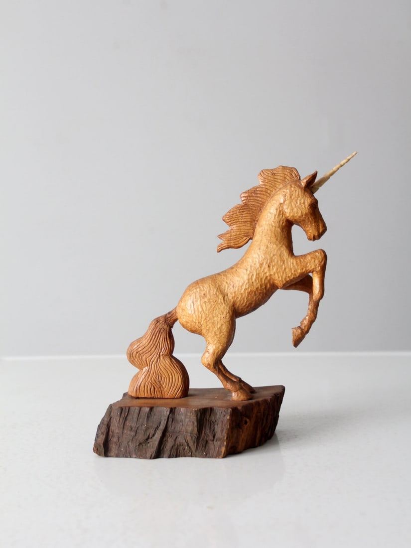 1984 A. La Croix Folk Art Unicorn Carving Vintage Wood Sculpture: 1984 A. La Croix Folk Art Unicorn Carving Vintage Wood Sculpture Discover this stunning vintage American folk art unicorn carving by artist A. La Croix, dated 1984. This exquisite hand-carved wooden p