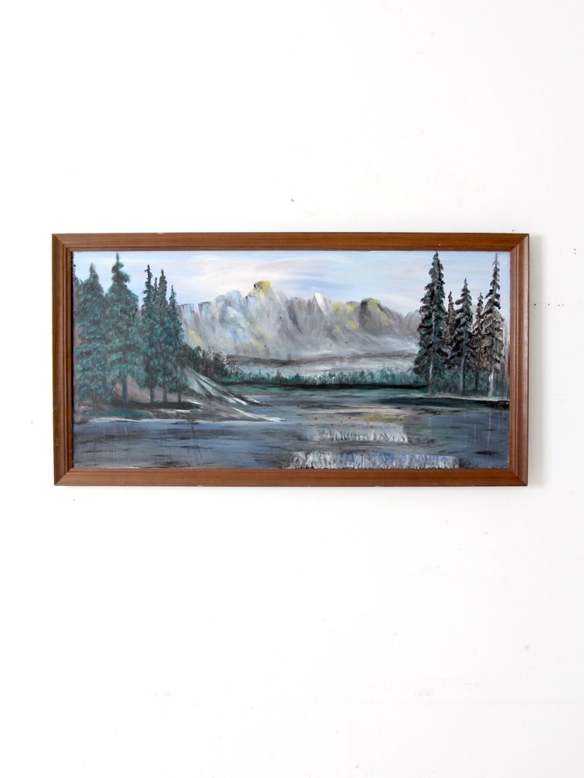 Rustic Vintage Mountain Lake Painting in Wood Frame 51.25 x 27.25 Inch: Rustic Vintage Mountain Lake Painting in Wood Frame 51.25 x 27.25 Inch This vintage mountain landscape painting on wood board captures a serene lake framed by evergreen trees and distant mountains. It