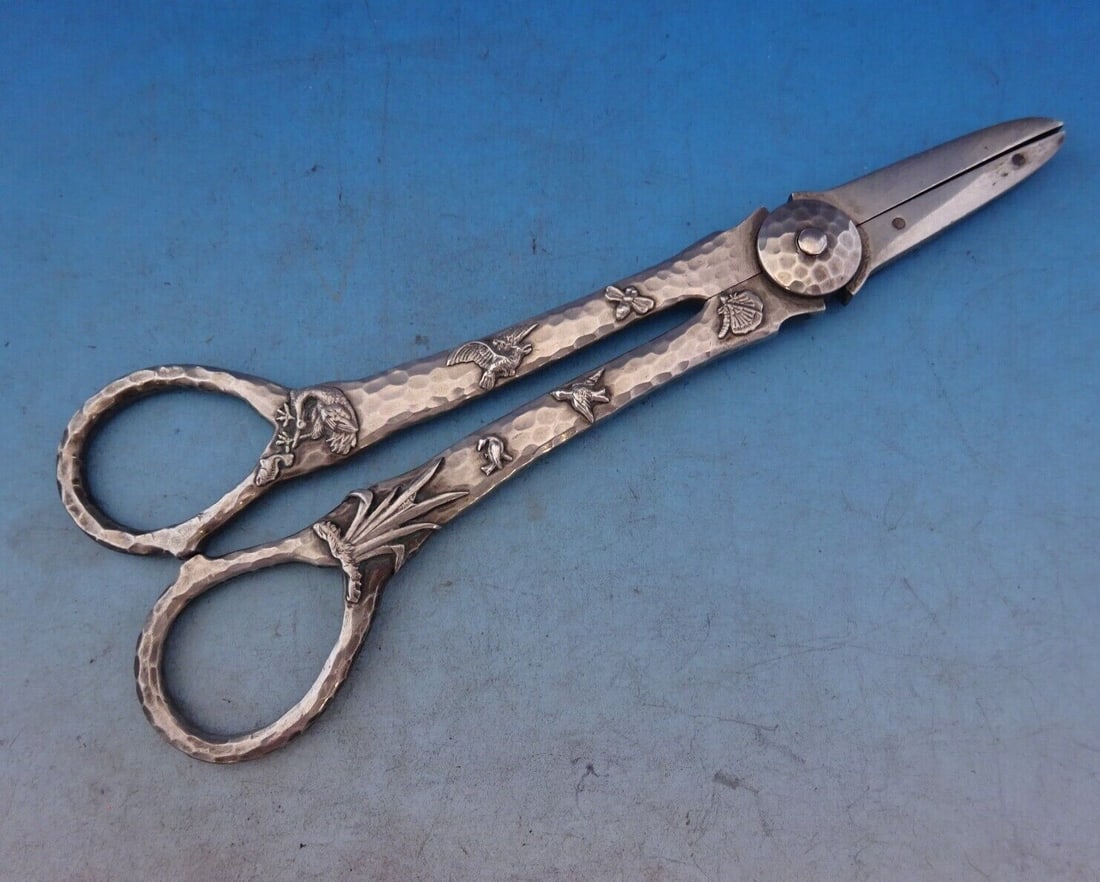 Gorham Sterling Silver Number 85 Grape Shears Japanesque Design: Gorham Sterling Silver Number 85 Grape Shears Japanesque Design Introducing the exquisite Number 85 Grape Shears by Gorham, crafted in sterling silver with a Japanesque aesthetic. Measuring 6 5/8 inch