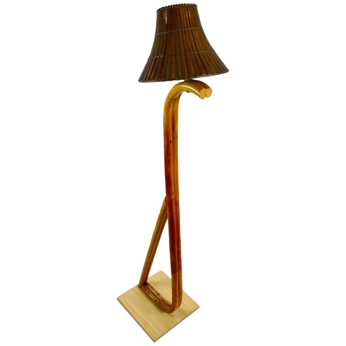 Elegant Vintage Bamboo Floor Lamp on Formica Base 62 Inches: Elegant Vintage Bamboo Floor Lamp on Formica Base 62 Inches This elegant Bamboo Floor Lamp features a gracefully curved bamboo structure set on a sturdy formica base. It stands tall at 62.0 inches, ma
