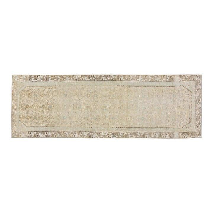 3'x9'4" Turkish Wool Runner Hand Knotted Vintage Style: 3'x9'4" Turkish Wool Runner Hand Knotted Vintage Style This vintage Turkish hand-knotted rug is crafted from wool using traditional rug-making techniques. Its timeless design merges classic artistry w