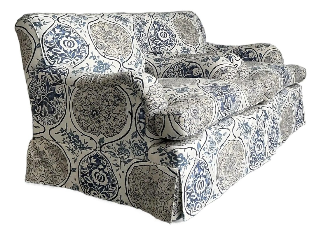 Pair of Vintage Lounge Chairs in Schumacher Katsugi Botanical Print: Pair of Vintage Lounge Chairs in Schumacher Katsugi Botanical Print This pair of vintage lounge chairs features a classic silhouette with rolled arms and a skirted base, upholstered in Schumacher's "K