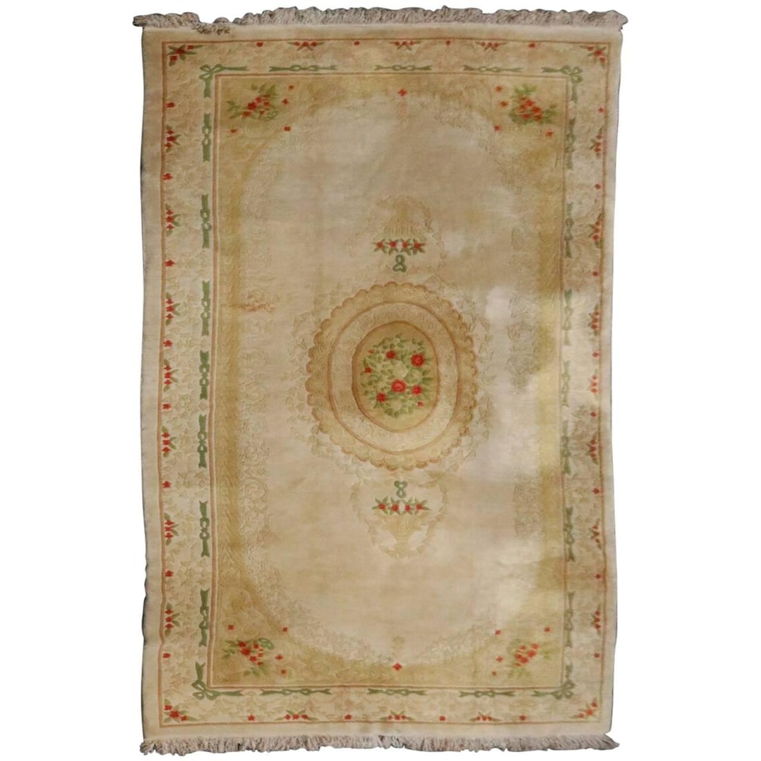 Floral Wool Carpet in Aubusson Style Cream Ground 120 x 192 Inches Circa 1950: Floral Wool Carpet in Aubusson Style Cream Ground 120 x 192 Inches Circa 1950 This oversized French Aubusson style carpet features a cream ground with a floral border of flowers and bows, and a centra