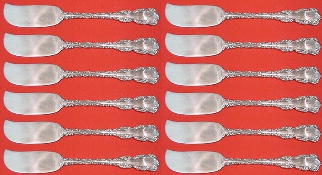 Whiting Louis XV Sterling Silver Butter Spreader Set 12 pcs 5 3/4": Whiting Louis XV Sterling Silver Butter Spreader Set 12 pcs 5 3/4" This exquisite 12-piece set of butter spreaders features the elegant Louis XV pattern by Whiting. Crafted from sterling silver, each 