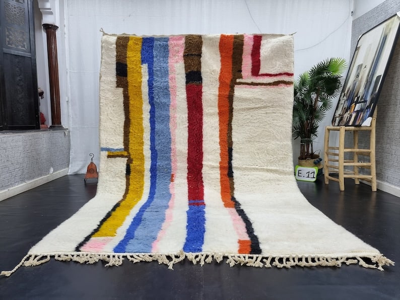 Handwoven Colorful Berber Rug 8 x 5 Feet Morocco: Handwoven Colorful Berber Rug 8 x 5 Feet Morocco This stunning colorful rug is handwoven in the Atlas Mountains by local Berber women weavers, showcasing traditional craftsmanship using natural local 