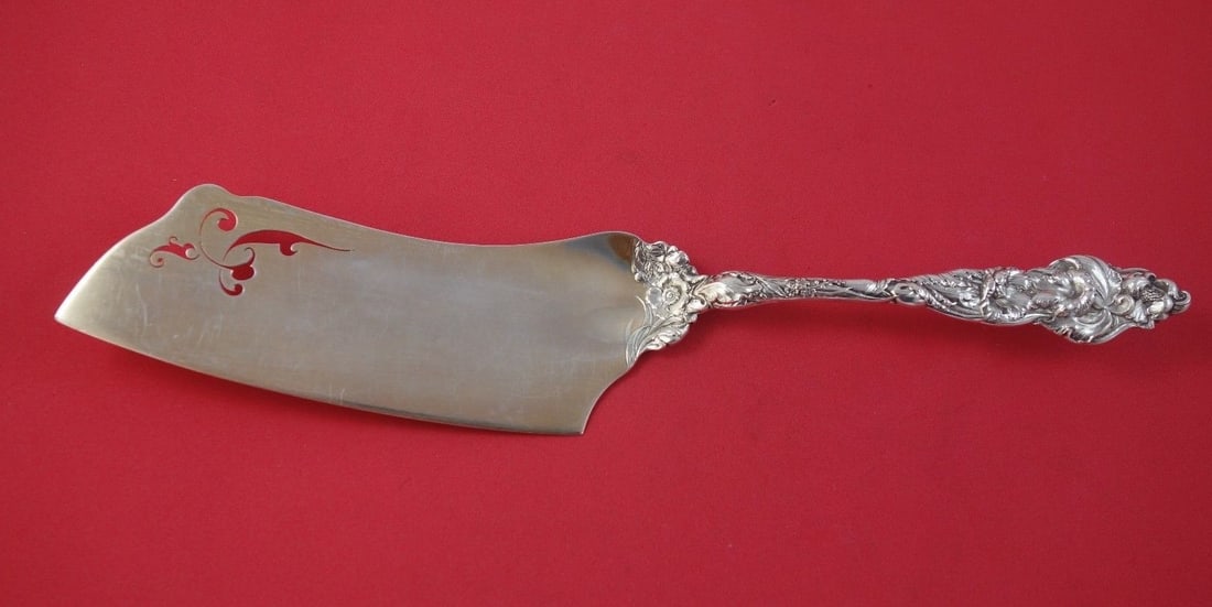 Reed & Barton Les Six Fleurs Sterling Silver Ice Cream Slice 12.5": Reed & Barton Les Six Fleurs Sterling Silver Ice Cream Slice 12.5" Presenting the exquisite Les Six Fleurs Ice Cream Slice by Reed & Barton, crafted from high-quality sterling silver. This elegant pie