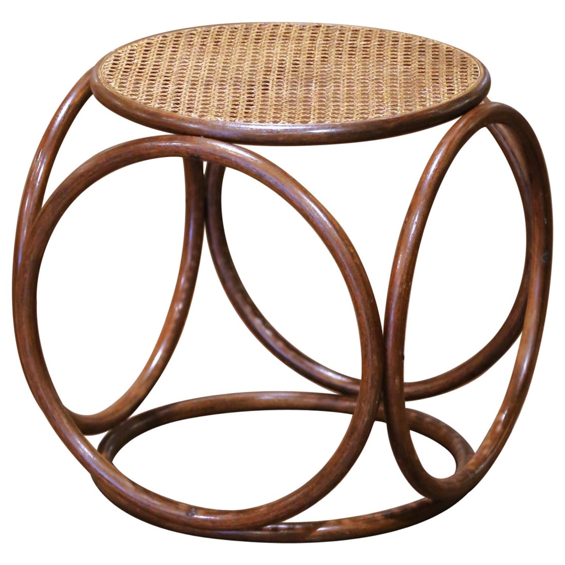 Vintage Thonet Style Bentwood Cane Ottoman Stool France 1930: Vintage Thonet Style Bentwood Cane Ottoman Stool France 1930 Crafted in France circa 1930 and attributed to renowned designer Michael Thonet, this elegant stool features a circular handwoven cane seat