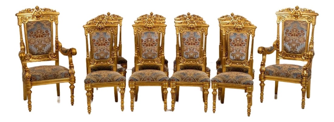 14 Gold Gilt Carved Dining Throne Chairs in Louis XIV Taste Set of 14: 14 Gold Gilt Carved Dining Throne Chairs in Louis XIV Taste Set of 14 This set of 14 French Louis XIV style throne dining chairs features elaborate carved details and a gold gilt finish. The chairs re