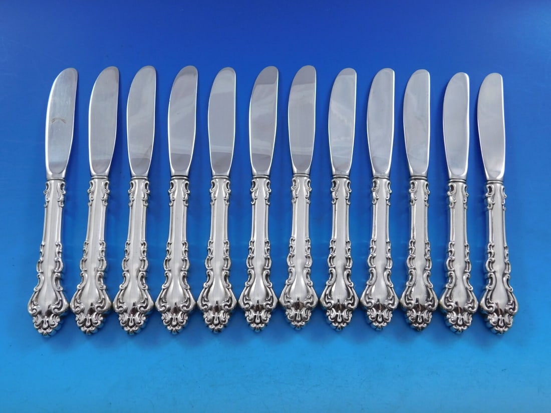 Reed & Barton Spanish Baroque Sterling Silver Butter Spreader Set 12 pcs: Reed & Barton Spanish Baroque Sterling Silver Butter Spreader Set 12 pcs This exquisite set features 12 butter spreaders in the elegant Spanish Baroque pattern by Reed & Barton. Each piece is crafted 