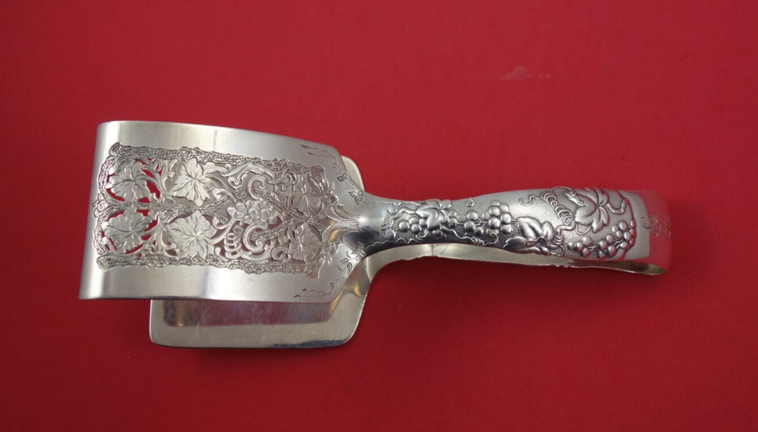 Tiffany & Co. Vine Sterling Silver Asparagus Tongs 7.5" Vintage: Tiffany & Co. Vine Sterling Silver Asparagus Tongs 7.5" Vintage This exquisite pair of asparagus tongs from the Tiffany & Co. Vine collection features a stunning design intricately crafted in sterling