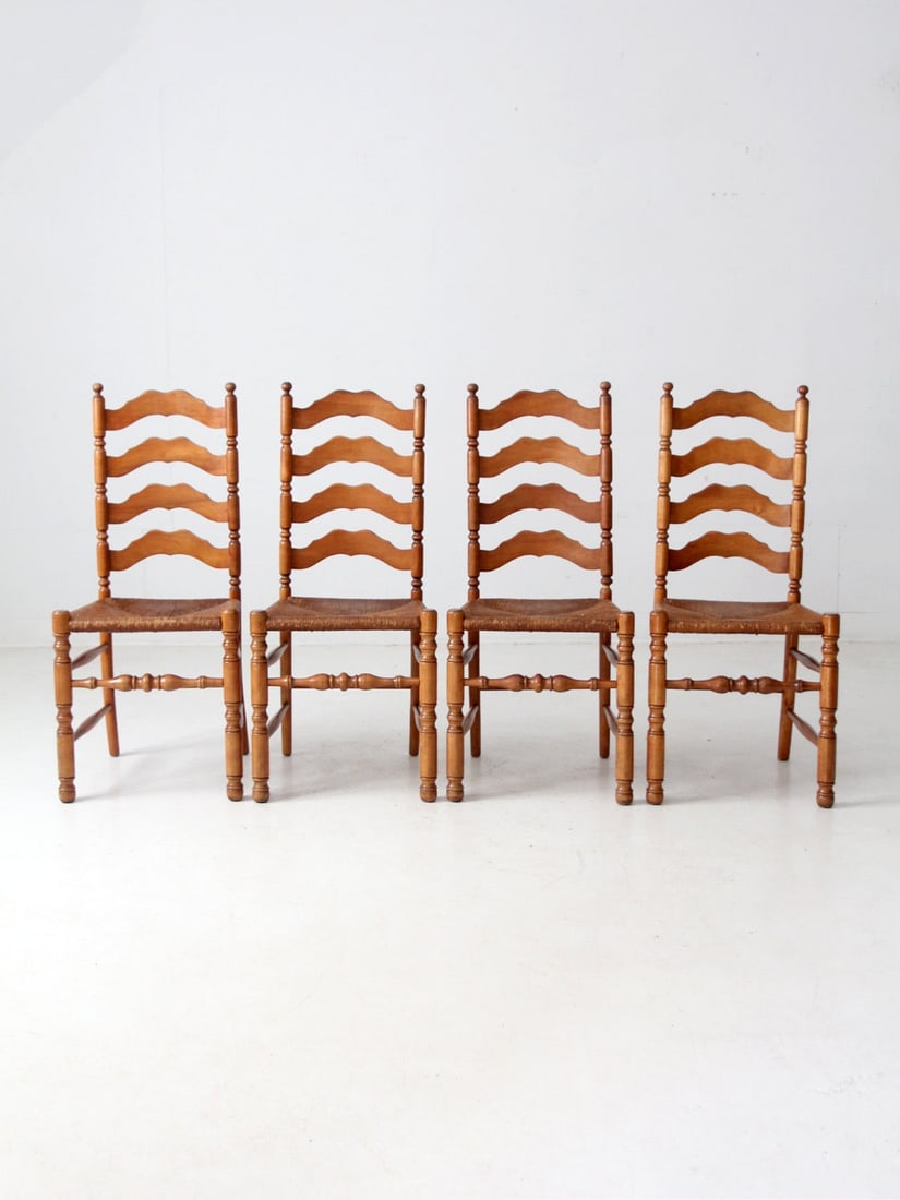 Set of 4 Vintage Ladder Back Dining Chairs with Rush Seats: Set of 4 Vintage Ladder Back Dining Chairs with Rush Seats Enhance your dining space with this charming set of four vintage ladder back dining chairs. Each chair features elegantly sculpted slat backs