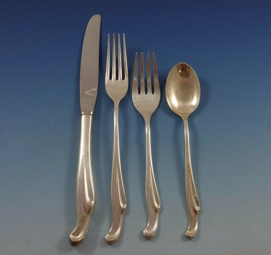 Towle Silver Surf by Stieff Sterling Silver 4-Piece Place Setting: Towle Silver Surf by Stieff Sterling Silver 4-Piece Place Setting Elevate your dining experience with this exquisite 4-piece place setting in the elegant Silver Surf pattern by Stieff. Crafted from hi