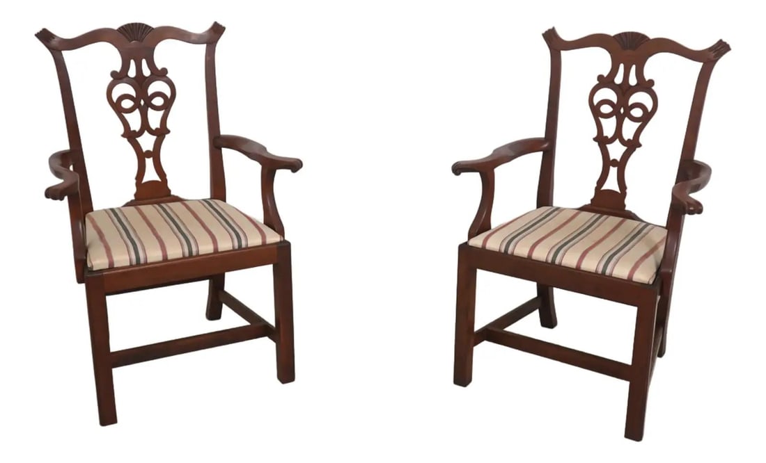 Set of Two Cherry Chippendale Armchairs Attributed to Eldred Wheeler: Set of Two Cherry Chippendale Armchairs Attributed to Eldred Wheeler This pair of Chippendale style armchairs features finely carved cherry wood frames with traditional scroll arms, shell carved crest