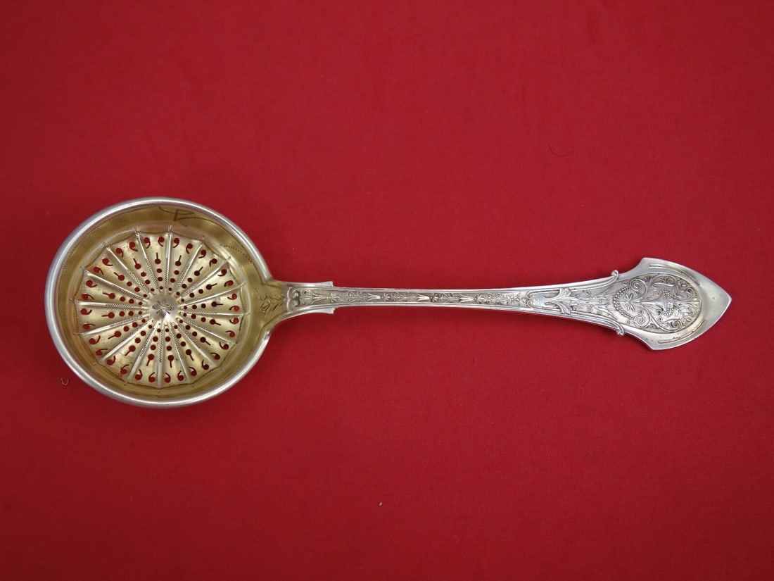 Wood & Hughes Angelo Sterling Silver Sugar Sifter Gold Washed 8 1/4 inches: Wood & Hughes Angelo Sterling Silver Sugar Sifter Gold Washed 8 1/4 inches Discover the exquisite Angelo sugar sifter, crafted by Wood & Hughes in the late 19th century. This beautiful piece features 