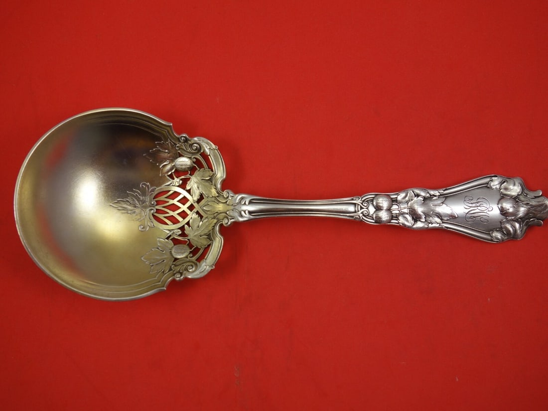 Gorham H 383 Sterling Silver Master Nut Spoon 9 3/8" Pierced Design: Gorham H 383 Sterling Silver Master Nut Spoon 9 3/8" Pierced Design Introducing the exquisite H 383 Master Nut Spoon by Gorham, crafted from high-quality sterling silver. This elegant serving spoon fe
