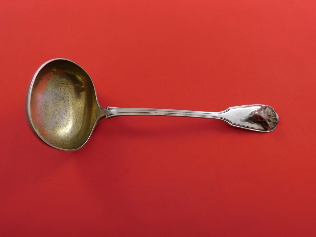 Koch & Bergfeld Sterling Silver Gravy Ladle 3-D Stag Gold Wash 7 1/4": Koch & Bergfeld Sterling Silver Gravy Ladle 3-D Stag Gold Wash 7 1/4" Discover this exquisite Koch and Bergfeld German Art Sterling Silver Gravy Ladle, featuring an intricate 3-D stag design. Measurin
