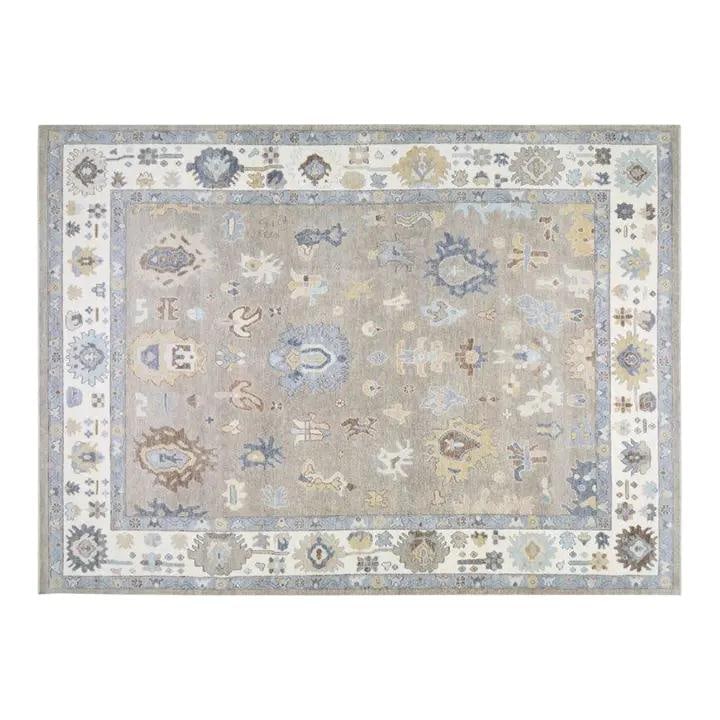 10'3 x 14' Turkish Oushak Wool Area Rug Hand Knotted: 10'3 x 14' Turkish Oushak Wool Area Rug Hand Knotted This transitional Turkish Oushak rug is hand-knotted from fine wool and features natural colors with a dominant brown hue. It combines traditional 