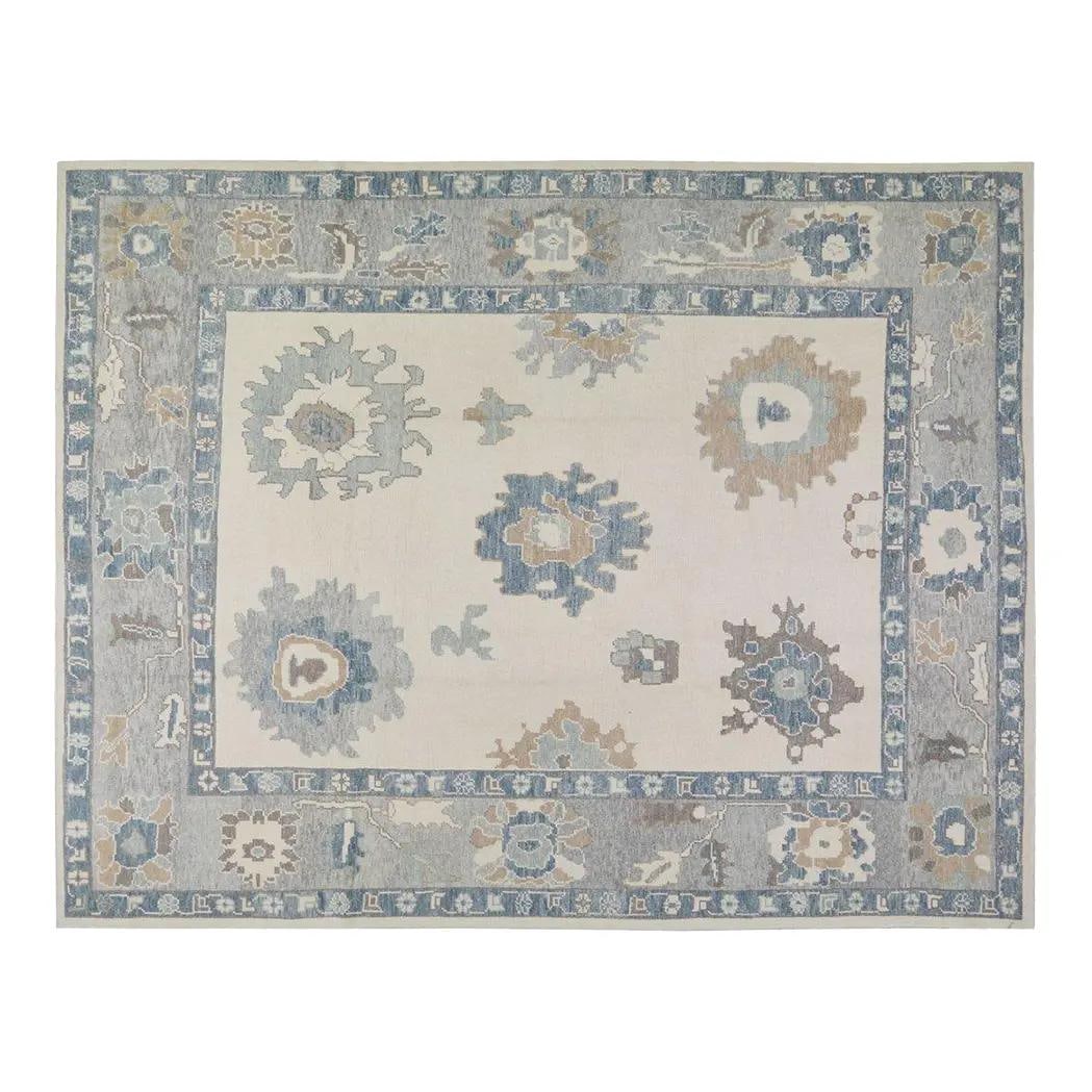 Hand-Knotted Wool Oushak Area Rug in Slate Gray 8'6" x 11': Hand-Knotted Wool Oushak Area Rug in Slate Gray 8'6" x 11' This vintage Oushak wool rug is hand-knotted using traditional techniques, showcasing skilled craftsmanship and timeless artistry. The rug fe